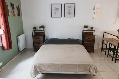 Un ou plusieurs lits dans un hébergement de l'établissement Evasion Prestige - Suite Spa, Sauna & Patio