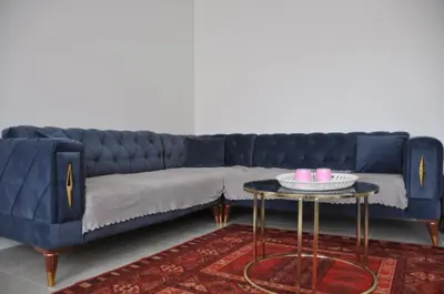Coin salon dans l'établissement Appartement avec Jardin
