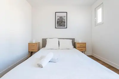 Un ou plusieurs lits dans un hébergement de l'établissement Charmant appartement - 4 personnes