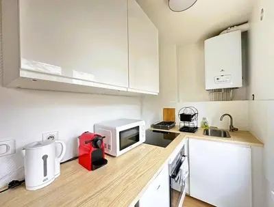 Cuisine ou kitchenette dans l'établissement Las Vegas - Cosy appartement - 4P