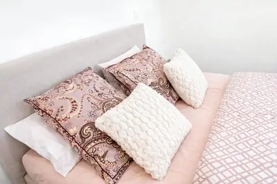 Un ou plusieurs lits dans un hébergement de l'établissement Appartement Cosy Centre Ville De Reims