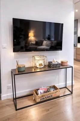 Télévision ou salle de divertissement dans l'établissement Appartement Cosy Centre Ville De Reims