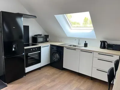 Cuisine ou kitchenette dans l'établissement Studio Centre Bourg Arrivée et Départ Autonome