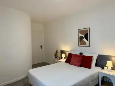Un ou plusieurs lits dans un hébergement de l'établissement Studio Rosa - Disney - Meaux City Center - Paris