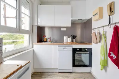 Cuisine ou kitchenette dans l'établissement Gîte de la Manufacture - Studio St-Gobain