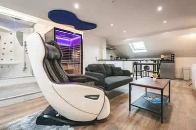 Coin salon dans l'établissement Loft Spa Sauna Hammam Hydromassage