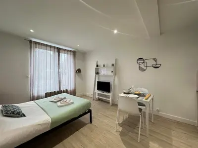 Un ou plusieurs lits dans un hébergement de l'établissement C Helsinki - Studio cosy près du centre-ville