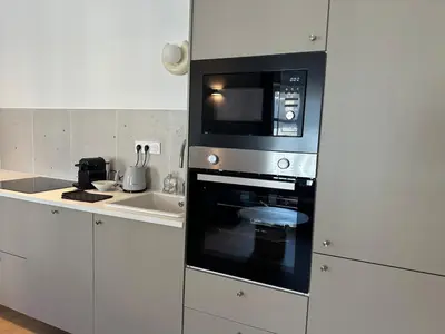 Cuisine ou kitchenette dans l'établissement Hyper Centre Cathedral Boulingrin 201