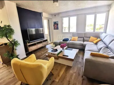 Coin salon dans l'établissement L'appart du bonheur à Reims