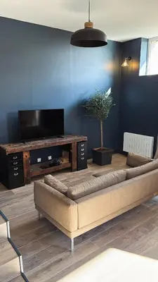 Télévision ou salle de divertissement dans l'établissement L'atelier de la Tour - Gite indépendant entièrement équipé