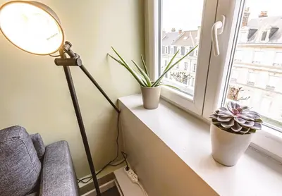 Coin salon dans l'établissement L'arc en Ciel - Appartement paisible à proximité de la Cathédrale