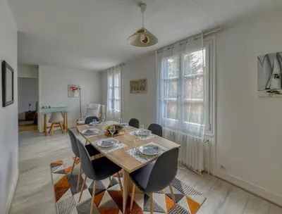 Coin salon dans l'établissement Le 33 Green Stay