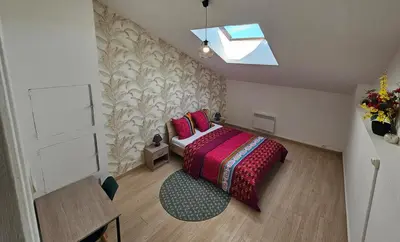 Un ou plusieurs lits dans un hébergement de l'établissement Appartement cosy avec bureau 35m2 au 2e étage