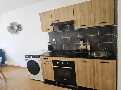 Cuisine ou kitchenette dans l'établissement Appartement cosy avec bureau 35m2 au 2e étage