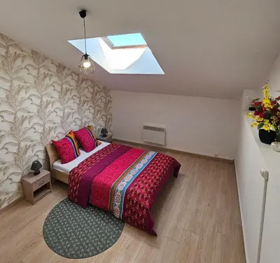 Un ou plusieurs lits dans un hébergement de l'établissement Appartement cosy avec bureau 35m2 au 2e étage