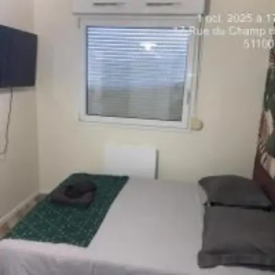 Un ou plusieurs lits dans un hébergement de l'établissement New studio near ARENA