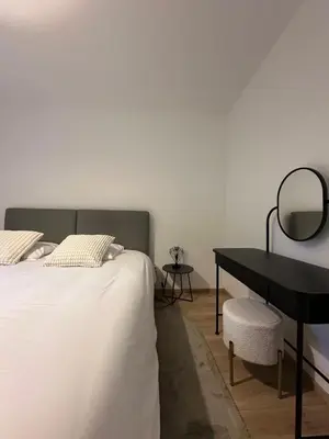 Un ou plusieurs lits dans un hébergement de l'établissement Maison cosy avec jardin privé hypercentre Charleville-Mézières à deux pas de la Place Ducale