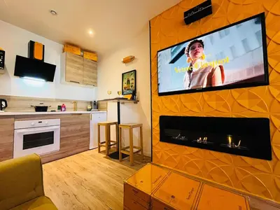 Cuisine ou kitchenette dans l'établissement L'Ecrin de Clicquot, studio cosy au cœur d'Epernay