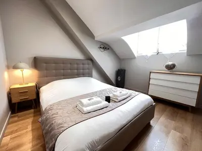 Un ou plusieurs lits dans un hébergement de l'établissement E - Le loft in Epernay T2 au cœur du centre ville