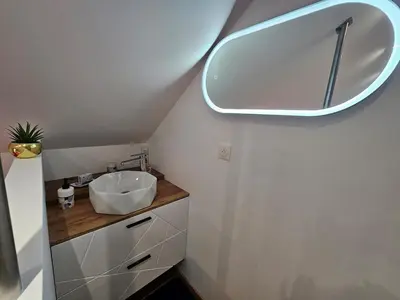 Salle de bains dans l'établissement O Cottage E Lavisse