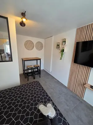 Télévision ou salle de divertissement dans l'établissement Sweet Cocon Studio