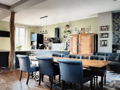 Coin salon dans l'établissement Grande maison familiale au vert