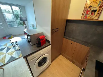 Cuisine ou kitchenette dans l'établissement Appartement lumineux et moderne proche gare