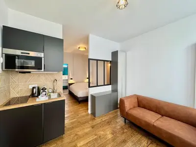 Cuisine ou kitchenette dans l'établissement Wellness Suite Ponsardin RDC - Reims Centre