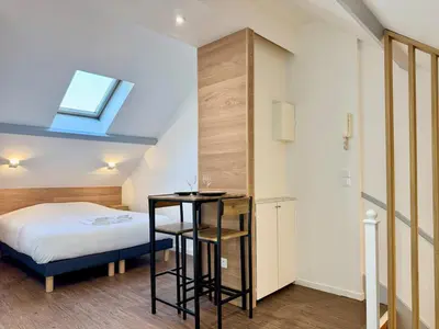 Un ou plusieurs lits dans un hébergement de l'établissement Wellness Suite Ponsardin 3 - Reims Centre