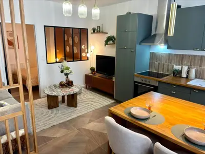 Cuisine ou kitchenette dans l'établissement Le Sienna - Centre ville et gare