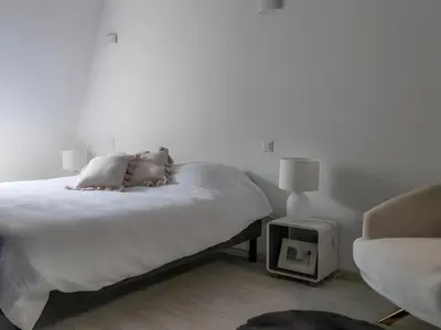 Un ou plusieurs lits dans un hébergement de l'établissement Spacieux duplex design - Reims centre