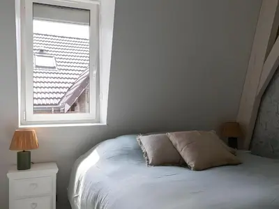 Un ou plusieurs lits dans un hébergement de l'établissement Spacieux duplex design - Reims centre