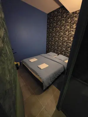 Un ou plusieurs lits dans un hébergement de l'établissement Love room - Jacuzzi - Salle de jeux complète