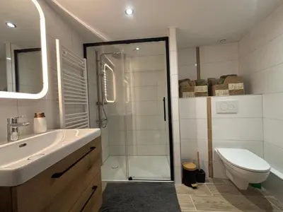 Salle de bains dans l'établissement Le Merisier