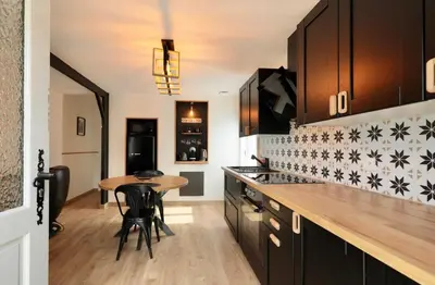 Cuisine ou kitchenette dans l'établissement La Ptite Maison Ardennaise