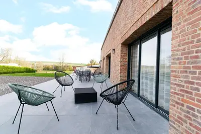 Balcon ou terrasse dans l'établissement L'atelier de Théo - Bain nordique Privé