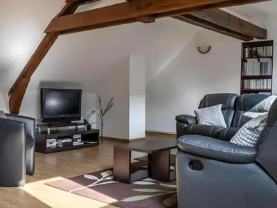Télévision ou salle de divertissement dans l'établissement Maison de campagne au cœur des vignes
