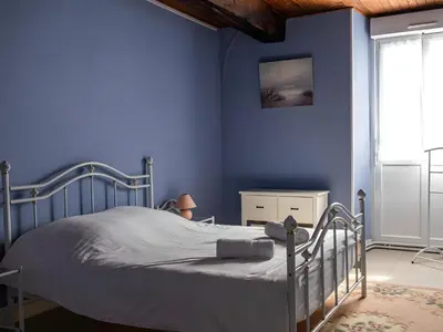 Un ou plusieurs lits dans un hébergement de l'établissement Maison de campagne au cœur des vignes
