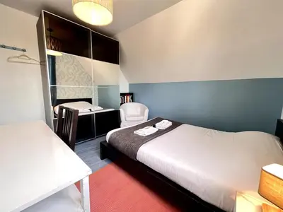 Un ou plusieurs lits dans un hébergement de l'établissement Claudius maison 3 chambres avec jardin proche Fac