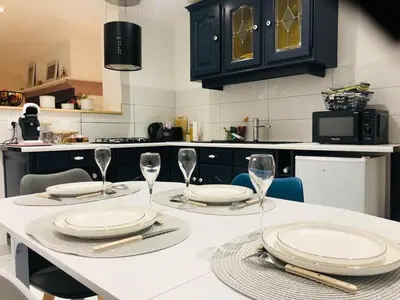Cuisine ou kitchenette dans l'établissement Maison de Maddy