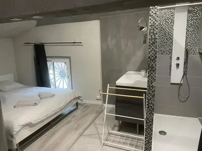 Un ou plusieurs lits dans un hébergement de l'établissement Appartement dans un cadre bucolique