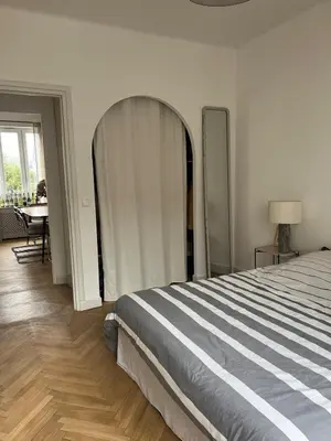 Un ou plusieurs lits dans un hébergement de l'établissement Appartement de charme au forum