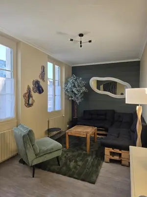 Coin salon dans l'établissement Maison centrale Hautvillers Berceau du Champagne