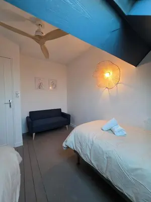 Un ou plusieurs lits dans un hébergement de l'établissement Maison centrale Hautvillers Berceau du Champagne