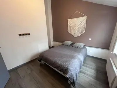 Un ou plusieurs lits dans un hébergement de l'établissement Logement au coeur de Roye