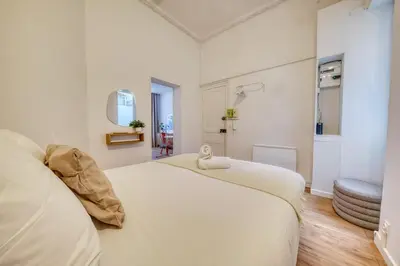 Un ou plusieurs lits dans un hébergement de l'établissement Le Bauhaus