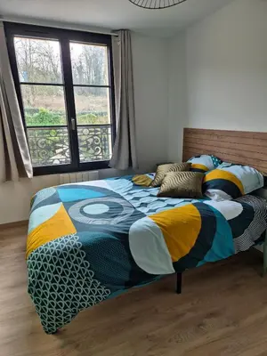 Un ou plusieurs lits dans un hébergement de l'établissement Maison Au Beau Regard
