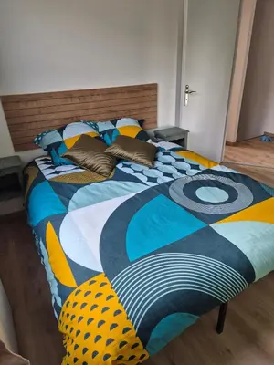 Un ou plusieurs lits dans un hébergement de l'établissement Maison Au Beau Regard