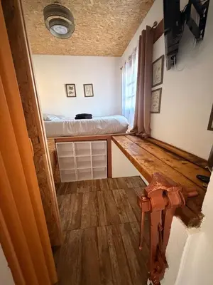 Télévision ou salle de divertissement dans l'établissement L'atelier