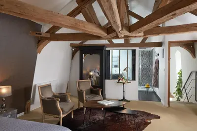 Coin salon dans l'établissement Maison d'hôtes La Chevalée